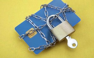 Credit Card Wrapped in Chains and Padlocked