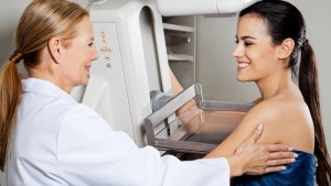 Doctor With Patient Getting Mammogram X-ray Test